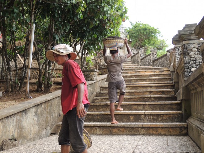 Workers Carrying Volcanic Ash for Construction